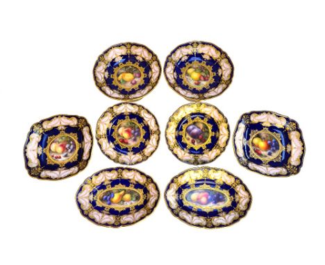 A Royal Worcester part dessert service by Richard Sebright, circa 1911, each painted in the centre with and arrangement of fr