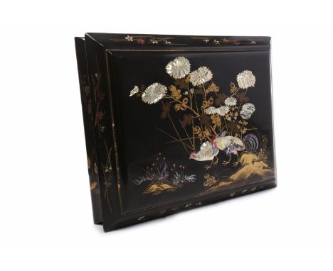 ATTRACTIVE LATE 19TH CENTURY JAPANESE GAMES COUNTER BOXthe oblong box of cushion form, the hinged cover decorated with cocker