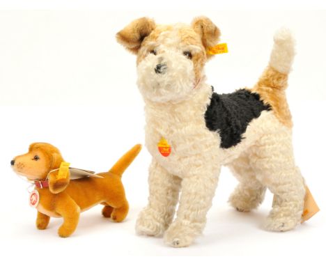 Steiff pair of mohair dogs: (1) Foxy foxterrier, yellow tag 031717, chest tag and swing labels, standing, areas of balding to