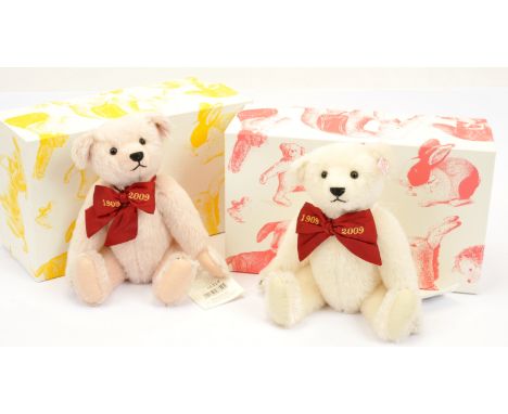 Steiff teddy bear pair including: (1) Margarete's teddy bear, white tag 038518, mohair, embroidered bow "1909-2009", swing la