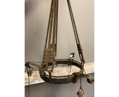 Antique metal worked arts and crafts inspired chandelier/ ceiling light. 