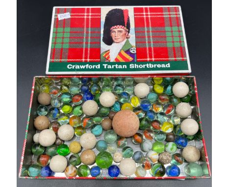 Vintage Crawford Tartan Shortbread advertising tin containing a collection of antique and vintage marbles. 