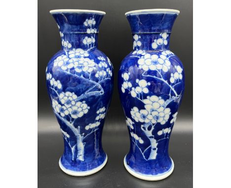 A Pair of Chinese Qing Dynasty Kangxi Nian Zhi - "Kangxi Period Make" blue and white blossom design vases. [25.5cm high] 