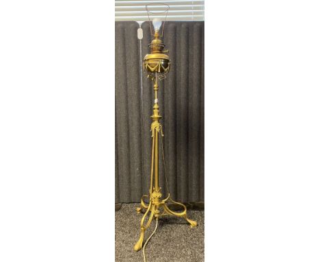19th century rise and fall ornate brass paraffin floor standing light. [Converted to electric] 
