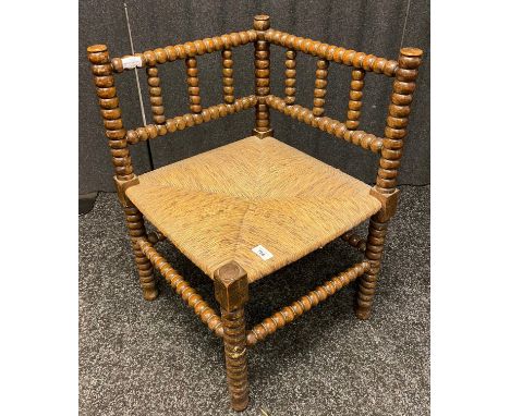 Arts &amp; Crafts Bobbin Turned corner chair. [65cm high] 