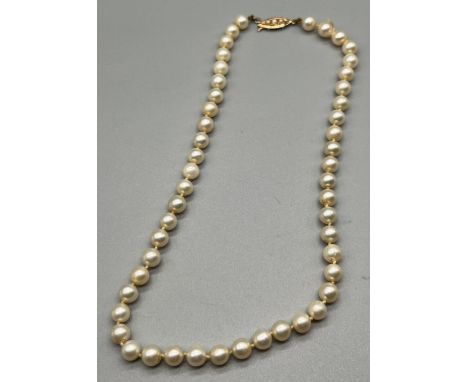 Vintage pearl necklace designed with a 9ct yellow gold clasp and catch. 
