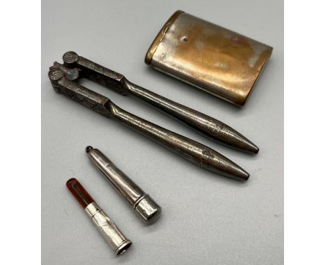 Birmingham silver cheroot holder and cheroot with amber fitment, Plated nut cracker and Antique vesta case. 