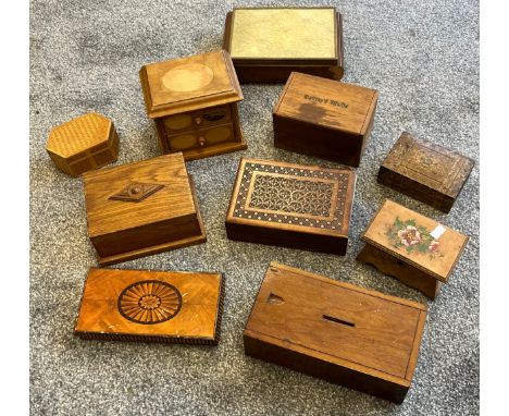 A Selection of vintage wooden storage boxes to include mauchline miniature chest of drawers and two vintage biscuit advertisi