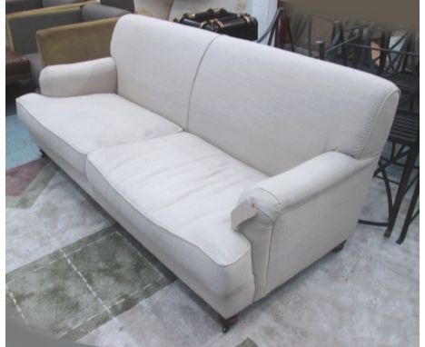 SOFA, two seater, in oatmeal fabric on turned castor supports, 198cm L. (with faults)