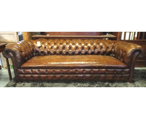 CHESTERFIELD SOFA, early 20th century hand finished brown leather, deep buttoned back and arms, 230cm W.