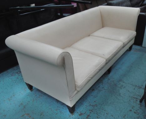 SOFA, three seater, in soft cream leather with roll arms and square tapering legs with brass caps, 220cm L x 85cm H x 85cm W.