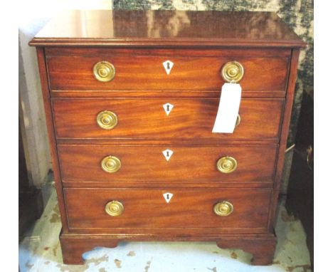 HALL COMMODE CHEST, George III mahogany of adapted shallow proportions with four long drawers, 70cm W x 34cm D x 77cm H.