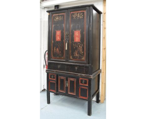 CABINET ON STAND, Chinese black lacquer with two doors enclosing a shelf and two drawers, above four further drawers and a pa