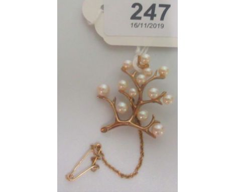 A 9ct gold and cultured pearl tree brooch, 4cm long.
