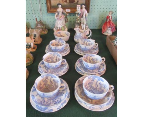 A Royal Worcester tea set, comprising: six trios, milk jug &amp; sugar bowl, with blue and white dragon decoration. Condition