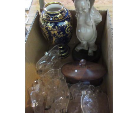 A Royal Bon pottery vase, decorated with The Cries of London, together with a carved mahogany tea caddy containing a silver p
