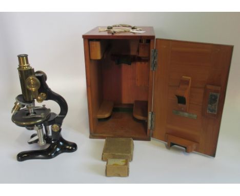 An early 20th century cased microscope by Voigtlander, Braunschweig, serial no. 50639 circa 1920.