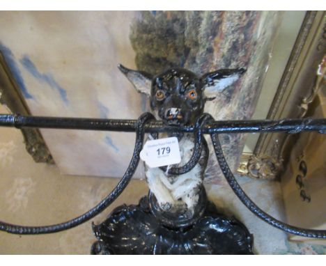 A Coalbrookdale cast iron dog stick stand.