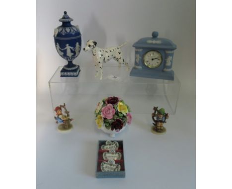 A Royal Stratford floral ornament, together with a Wedgwood mantle clock, two Hummel figures and other related items. Conditi