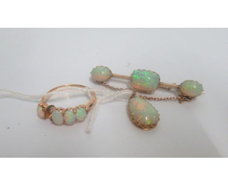 An opal brooch/pendant, together with a matching opal ring.