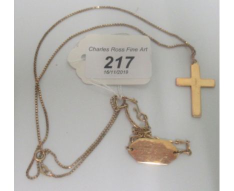 A 9ct gold crucifix on a 9ct gold chain, together with a gold wrist band. Condition Report: Weight = 12.6 g 