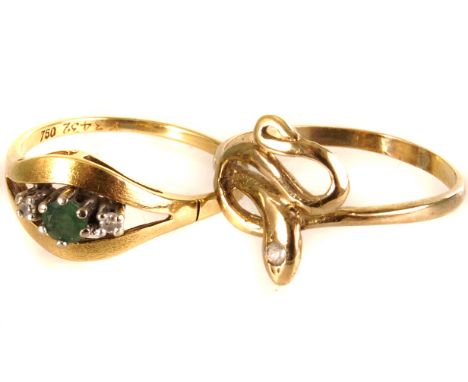 An 18ct gold, emerald and diamond dress ring, together with a 14k marked serpent dress ring set with a clear stone, approx 2.