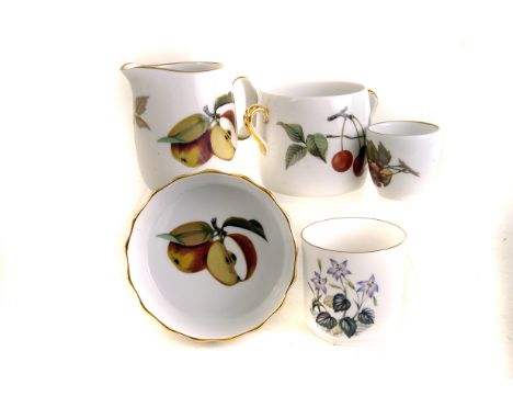 A selection of Royal Worcester Evesham pattern ceramics, including two flan dishes, jugs, dishes and more (parcel)