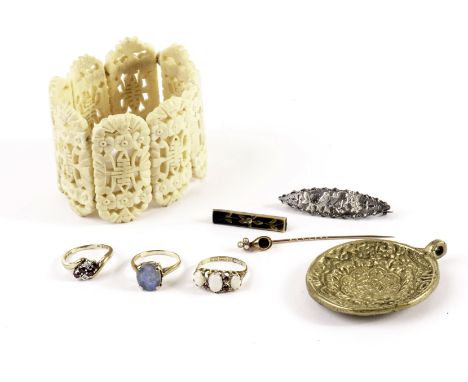 Three 9ct gold and gem set rings, AF, together with a 15ct and gem set stick pin, a carved bone bracelet, a silver brooch, a 