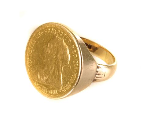 A half sovereign gents signet ring, dated 1895, mounted on a 9ct gold band