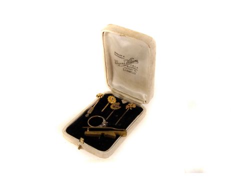 Two 15ct gold gem set stick pins, together with two 9ct gold stick pins, a 9ct gold and silver ring, AF and another item (6)