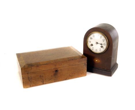 A walnut writing slope, together with a mahogany mantle clock with eight day movement (2)