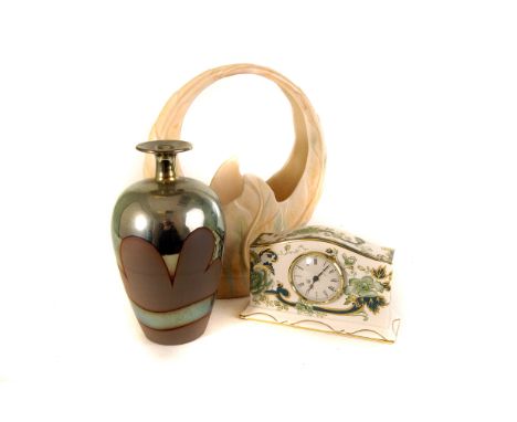 An Art Deco Beswick pottery basket, together with a Ewering pottery basket dish, a Mason's ironstone mantle clock and a studi
