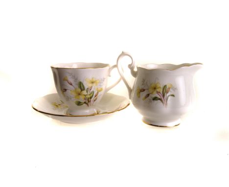 A Royal Albert Primrose 'Friendship' pattern tea service, comprising six cups and saucers, sugar bowl, milk jug, six side pla