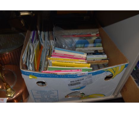 A box full of O/S maps, books and similar ephemera.