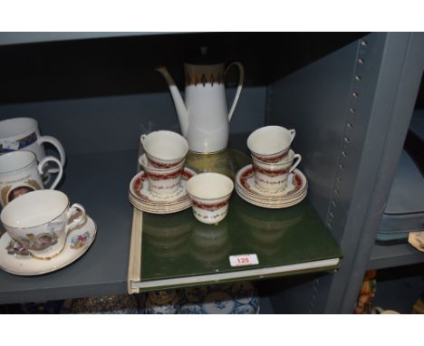 A selection of tea cups and saucers having red and gilt design and similar Windsor coffee pot