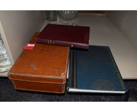 A vintage leather case initialled with S.B.L R, a copy of Woman's Pictorial dated 1926 and an atlas.