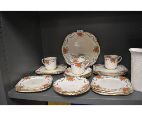 A part tea service by Taylor and Kent in an art deco design having enamel detailing