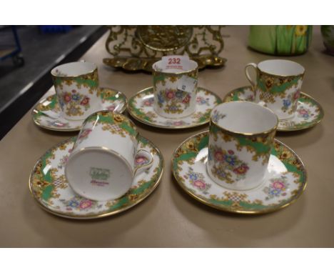 Five Shelley Sheraton 13290 coffee cans and saucers in the green colour way, having back stamp of 'fine bone china,Shelley,En