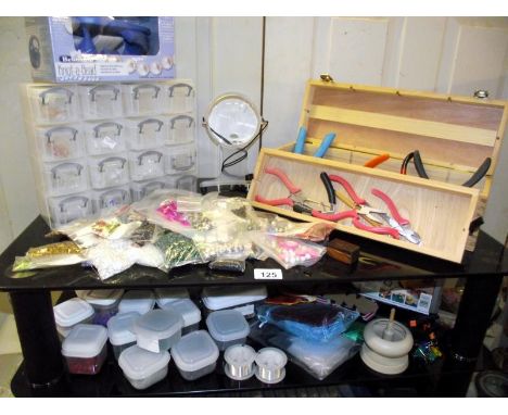 A quantity of jewellery making items, including tools and beads etc