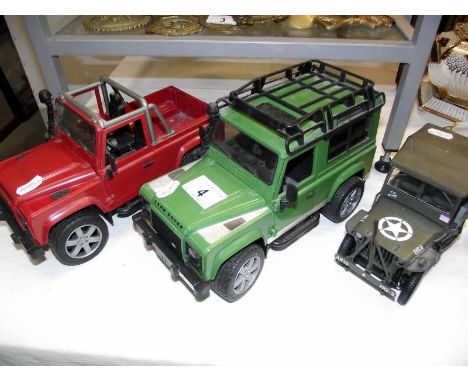 2 Bruder Land rovers and a Solido Willys Jeep