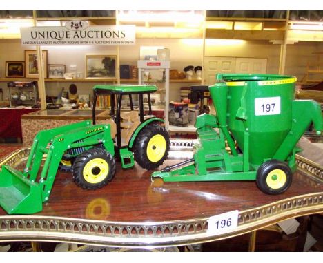 A large diecast ERTL John Deere tractor