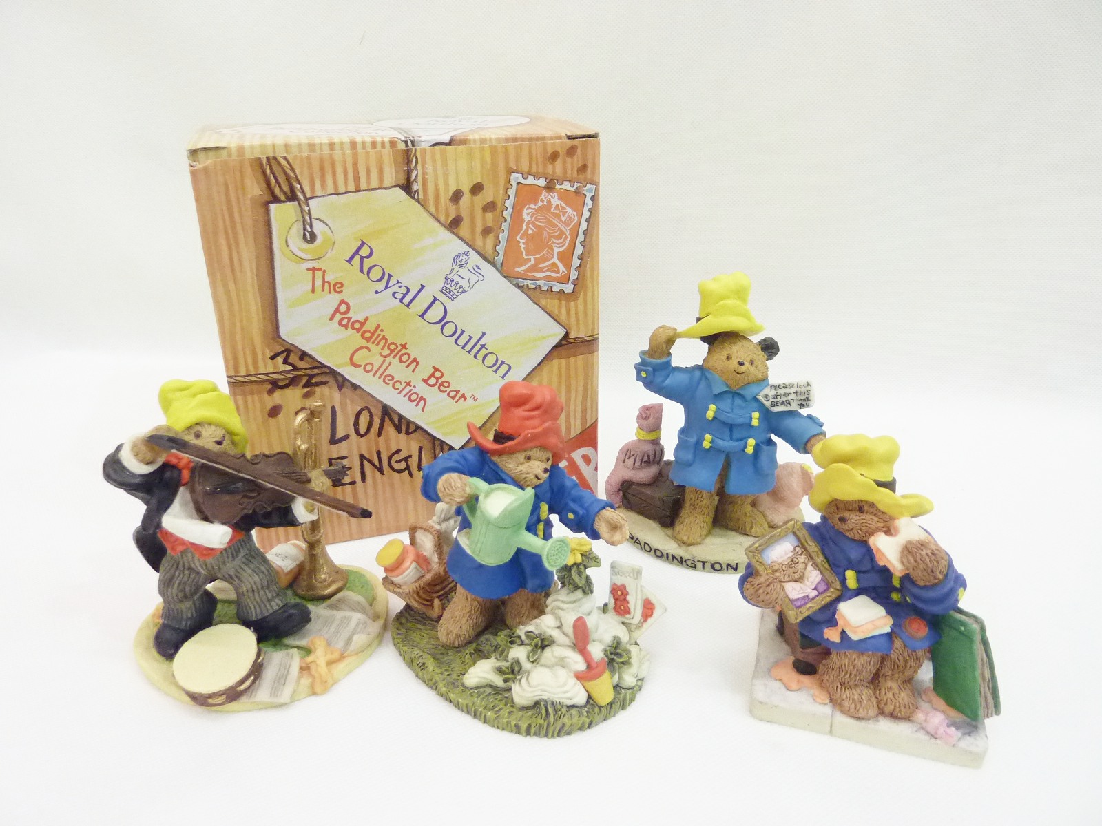 (4) Royal Doulton Paddington Bear figures from 'The Paddington Bear