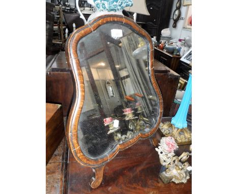 A QUEEN ANNE STYLE WALNUT FRAMED EASEL MIRROR of cartouche form, 42 cms wide
