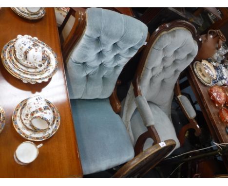 A VICTORIAN BUTTON-BACK ARMCHAIR with open arms and show wood frame and another Victorian button chair