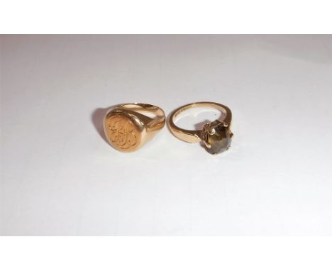 A 9CT YELLOW GOLD DRESS RING and a signet ring (2)