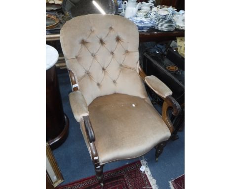 A WILLIAM IV ROSEWOOD BUTTON-BACK OPEN ARMCHAIR with carved scrolls and turned legs