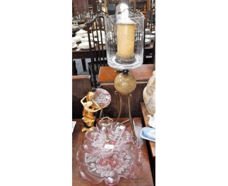AN ART NOUVEAU STYLE MIRROR in the form of a woman looking into a mirror, a storm lamp on a tripod stand and a pink glass cak