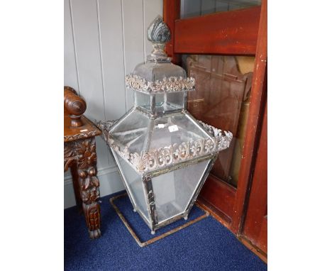 A VICTORIAN GLAZED COPPER STREET LANTERN, 91 cm high, with an iron bracket