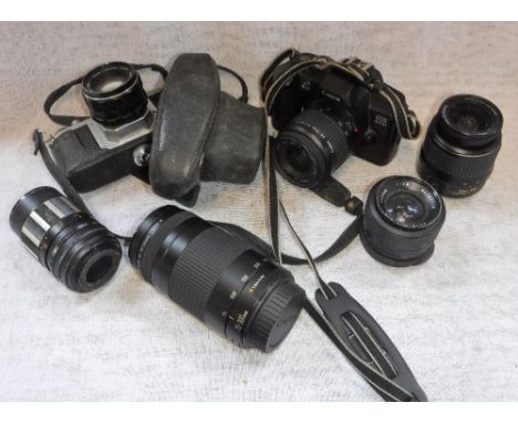 A CANON EOS 5000 CAMERA, a Pentax S1a and a collection of lenses