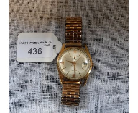 A GENTLEMAN'S YELLOW METAL WRISTWATCH, the round dial with baton numerals, sweep seconds and date aperture, inscribed 'Favre-